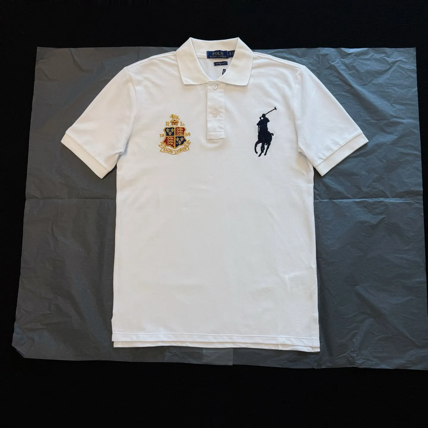 P170 Style No. RL01 (four colors) Ralph Lauren/Ralph Lauren Basic Malaysian Crown 👑Club emblem embroidered logo Big Pony Lapel Polo shirt T-shirt short-sleeved fabric 100% piqué cotton, imported embroidered logo on the chest, custom threaded collar, Malaysian embroidery, the highest version, suitable for business and leisure daily use! 🌘Two-button placket, laser logo pearlescent resin buttons, cuffs and hem using double-thread sewing technology, different currency versions, full set of original three-label accessories!   SIZE #S~XXL Color#Black Navy Gray White